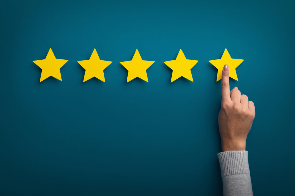 woman hand selecting 5 stars after choosing the best window